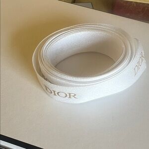 Dior Luxurious White Ribbon with Gold Accents